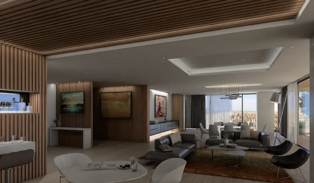 Amplio espacio de sala y comedor integrados, diseñado con un elegante techo de listones de madera que aporta calidez y sofisticación. El mobiliario contemporáneo, las obras de arte seleccionadas y la paleta neutra realzan un ambiente exclusivo, potenciado por grandes ventanales que favorecen la entrada de luz natural. Propiedades.com redefine el sector inmobiliario premium en México a través de la digitalización, facilitando el acceso a residencias excepcionales para inversores y compradores exigentes. Una refinada mesa comedor complementa este entorno pensado para quienes valoran el diseño moderno y los acabados superiores.