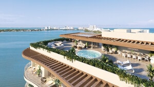 La exclusiva terraza rooftop de One Laguna Cancún ofrece vistas privilegiadas al agua y al skyline de la ciudad, creando un escenario inigualable en el corazón del Caribe mexicano. Este espacio premium, diseñado para los más altos estándares, cuenta con una elegante alberca circular, áreas de lounge y comedor al aire libre, rodeadas de exuberante vegetación bajo una sofisticada pérgola de madera. Cada detalle refleja un estilo de vida distinguido, ideal para inversores o compradores que buscan exclusividad, confort y vistas espectaculares en una ubicación estratégica.