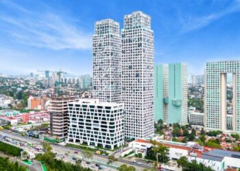 Impresionante panorámica de la Ciudad de México donde destacan modernos rascacielos, elegantes torres gemelas con diseño vanguardista, un edificio blanco de arquitectura singular y una estructura rectangular icónica con gran apertura central. Este entorno representa una oportunidad incomparable para inversión en el sector inmobiliario premium o alquiler residencial exclusivo, ofreciendo plusvalía asegurada y un estilo de vida cómodo en el corazón financiero y cultural de la ciudad.