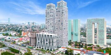 Impresionante panorámica de la Ciudad de México donde destacan modernos rascacielos, elegantes torres gemelas con diseño vanguardista, un edificio blanco de arquitectura singular y una estructura rectangular icónica con gran apertura central. Este entorno representa una oportunidad incomparable para inversión en el sector inmobiliario premium o alquiler residencial exclusivo, ofreciendo plusvalía asegurada y un estilo de vida cómodo en el corazón financiero y cultural de la ciudad.